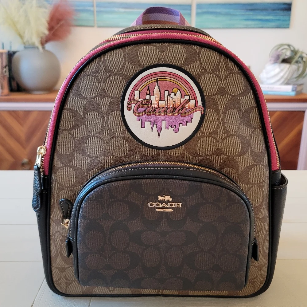 Coach Signature Brown Tan Backpack with Pink Trim and Purple Accent